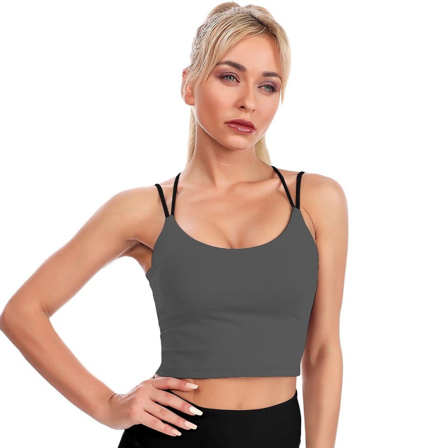 Woman wearing a gray tank top on a white background