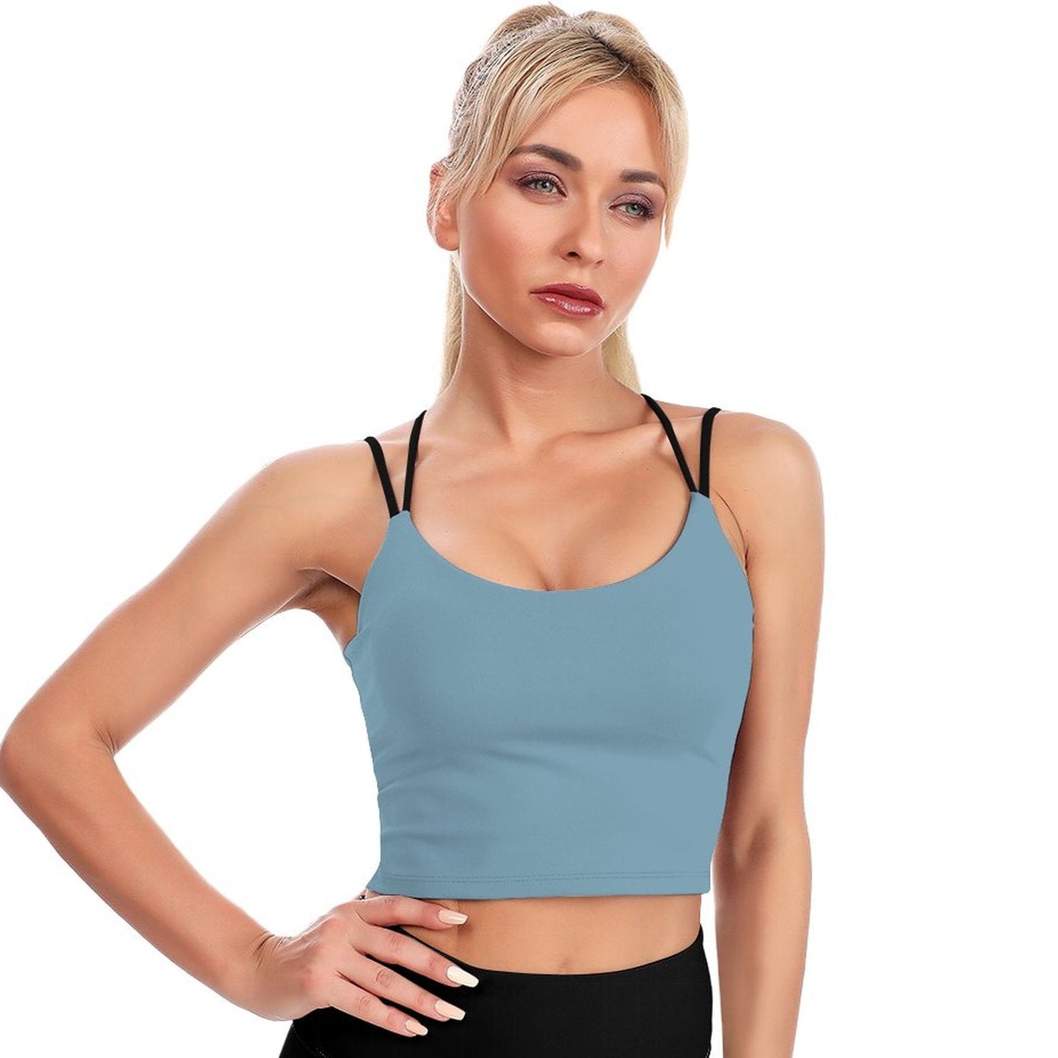 Woman wearing a light blue tank top on a white background