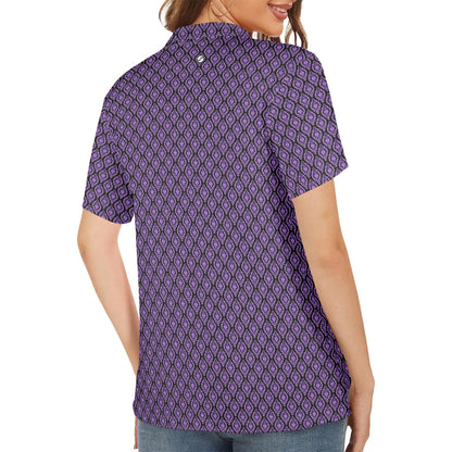 Person wearing a purple patterned shirt on a white background